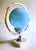An exceptional sculptural table lamp that blends the geometric elegance of the Art Deco movement with the orbital forms...