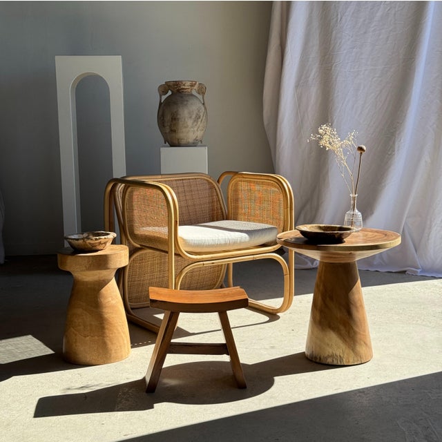 Stool, side table, or end table in natural solid mango wood. This modular piece of furniture features a geometric shape...