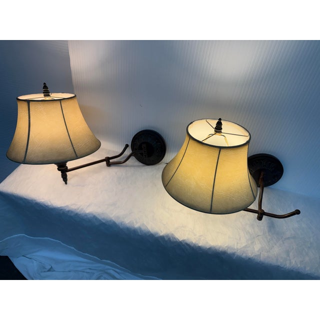 Design Plus Gallery presents a Pair of French Rustic Swing Arm Sconces from Barnes & Ivy. Add a sense of French cottage...