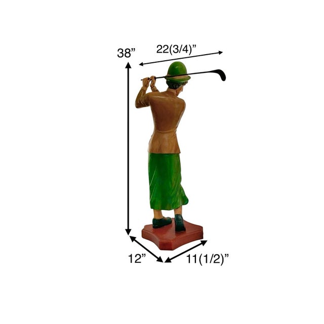 This is a large vintage sculpture of a woman golfing with a club, serving as home or store decor. This unique statue...