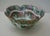 This exquisite mid-century porcelain bowl features a scalloped rim and a traditional "Rose Cantonese" style palette. The...