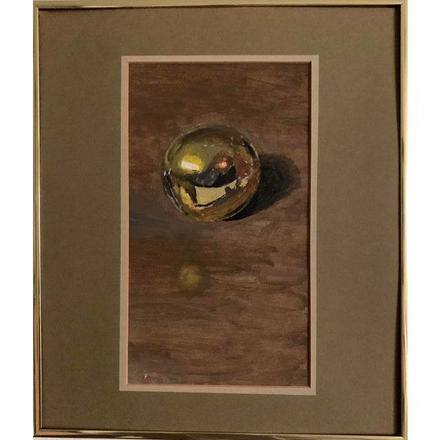 A still life about reflection reflected through an orb. Framed, matted and signed by the artist in shades of brown, gold...