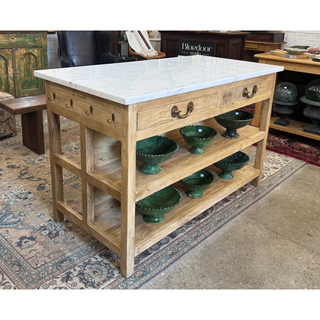 A versatile island or work table designed for open-concept kitchens, laundry rooms, craft rooms, or studio spaces. Made...