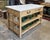 A versatile island or work table designed for open-concept kitchens, laundry rooms, craft rooms, or studio spaces. Made...