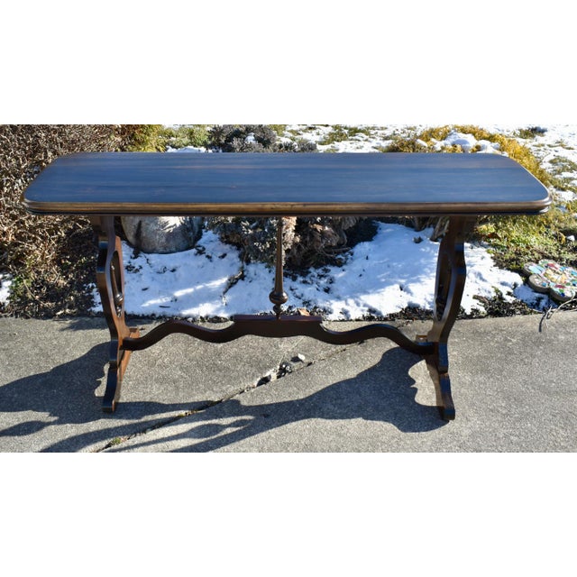 Vintage (1950's) Console / Sofa Table has a Jacobean Style. The Wood is Walnut. Stretcher Base. The Measurements: 60"L x...