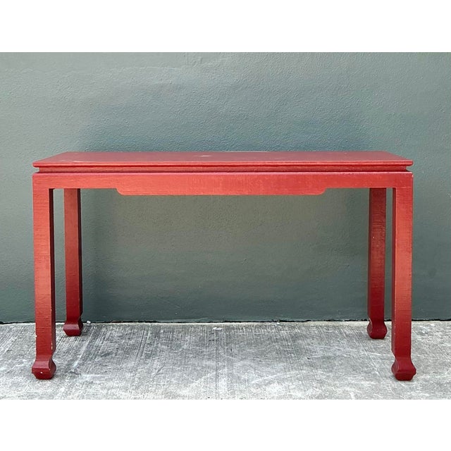 This striking vintage console table beautifully marries the clean, architectural lines of traditional Ming furniture with...
