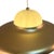 Hanging pedant, originating from Scandinavia. A gold colored metal brim is supported bu a white plastic, translucent dome...