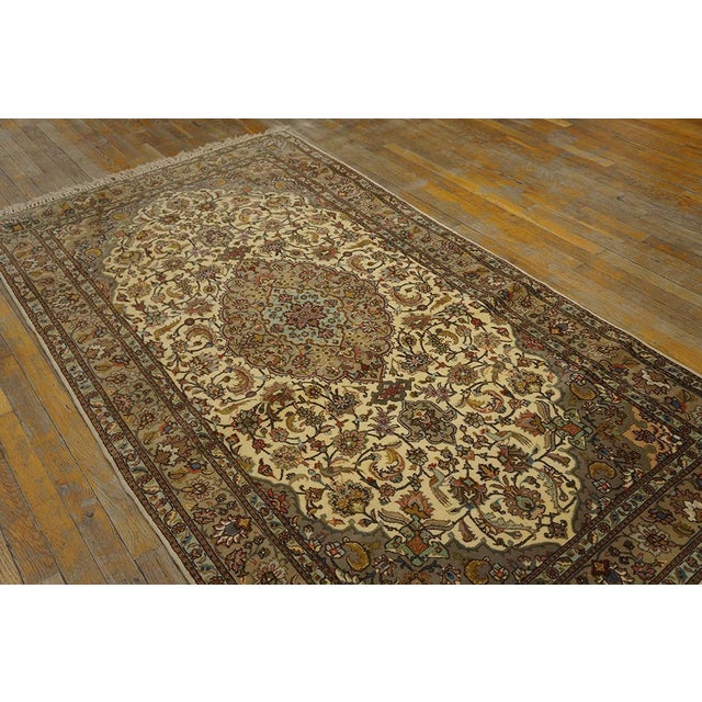 Antique Persian Tabriz rug, size: 3' 10'' x 7' 1''. A one-of-a-kind antique Tabriz rug Tabriz is a major city in...