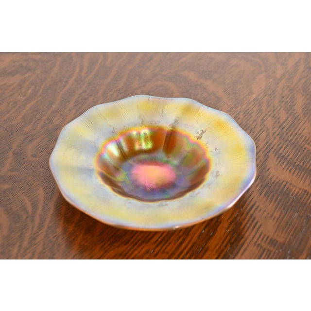 A gorgeous Arts & Crafts or Art Nouveau period Aurene iridescent art glass plate or catchall dish By Steuben Glass USA,...