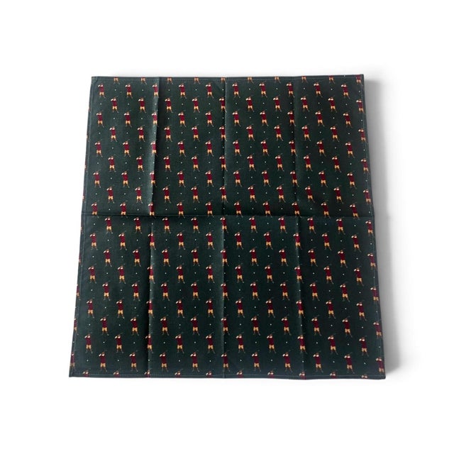A charming set of six vintage cocktail napkins featuring a classic golfer motif, reminiscent of traditional country club...