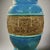 A Mid Century glazed ceramic Italian vase featuring a terrific blue glaze. The vase is girdled with an unglazed band of...