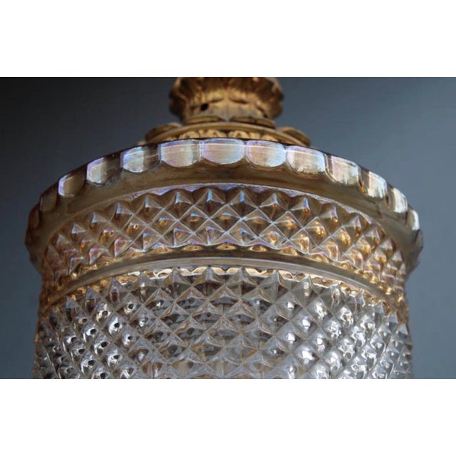 The Vistosi 1950s Murano glass pendant chandelier is a highly collectible mid-century modern lighting fixture crafted from...