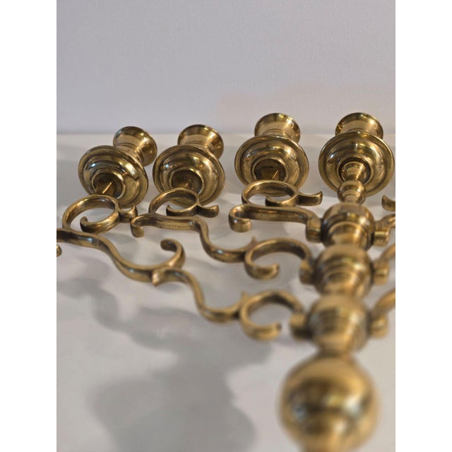 This exquisite seven-branched solid brass menorah candelabra brings a touch of history and elegance to any home. With an...