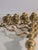 This exquisite seven-branched solid brass menorah candelabra brings a touch of history and elegance to any home. With an...