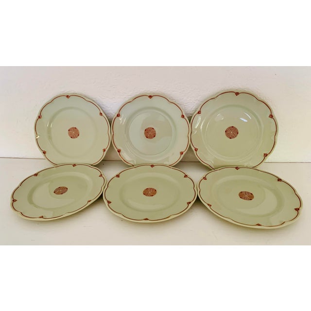 The distinctive combination of a soft celadon green backdrop with the vivid red geometric graphics makes Mignardise one of...