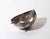 Elegant modernist silver-plated serving dish in an organic leaf-inspired form, featuring an elongated asymmetrical bowl...