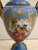 Visually stunning pair of late 19th Century French Manufacture de Sevres urns in popular Bleu Celeste color with gilt...