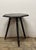 There is a certain refinement to a well-made tripod table — a piece that feels both delicate and assured, its balance...