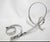 David Herschler, free standing chromed metal ribbon twist modern art sculpture. Measures approximately 20" x 10" x 10"...