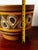 Vintage mid-century modern ceramic planter featuring a bold dimensional glossy glaze design over a mostly matte brown and...