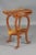 Occasional table in Emile Galle style. Various colored veneers on solid wood.