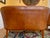 Rescued from a Parisian houseboat on the Siene, cognac/tan leather loveseat and a matching pair of club chairs with...