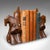 This is a delightful pair of antique Scottie dog bookends. An English, figural book rest in beech, dating to the Edwardian...