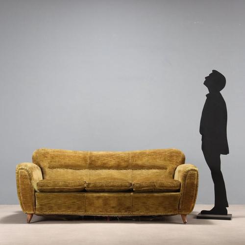 Vintage sofa with sprung padding and feather cushions, upholstered in original period fabric; wooden legs. The seat can be...