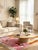 Modern Boujad Rug | Handwoven Wool Rug in Pink with Tribal Symbols & Striped Field This modern Boujad rug splits its...