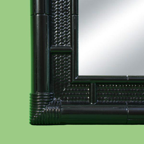 Make a bold statement with this vintage faux bamboo black mirror. The intricately carved bamboo-motif frame in a rich...