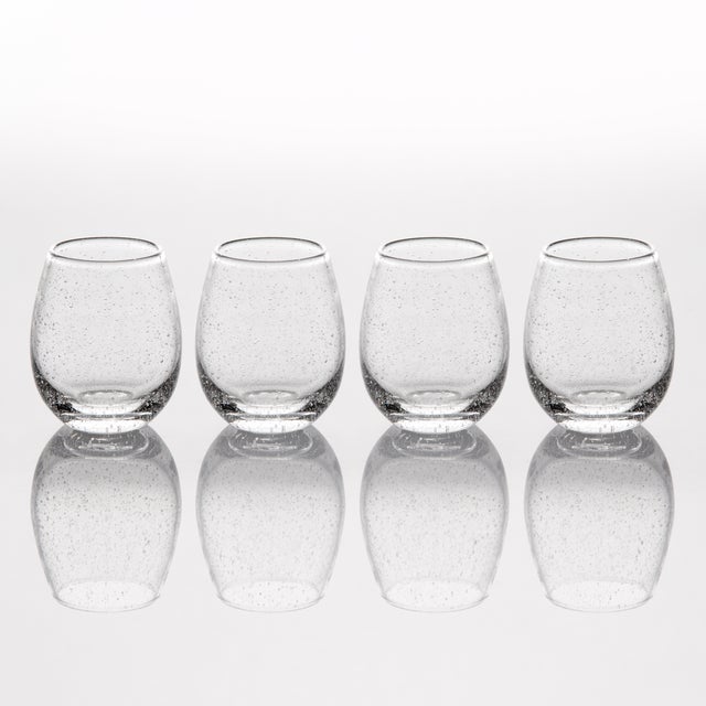 Abigails take on the popular stemless wine glasses. All hand blown with tiny bubbles trapped in the glass during the...