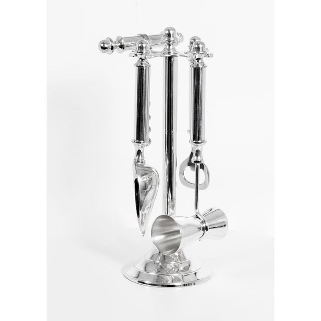 This is an elegant and useful Vintage silver plated accessory set for your bar, dating from the late 20th Century\. It has...