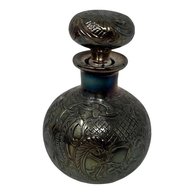 An elegant American Art Nouveau sterling silver overlay perfume bottle by the Alvin Manufacturing Company of Providence,...