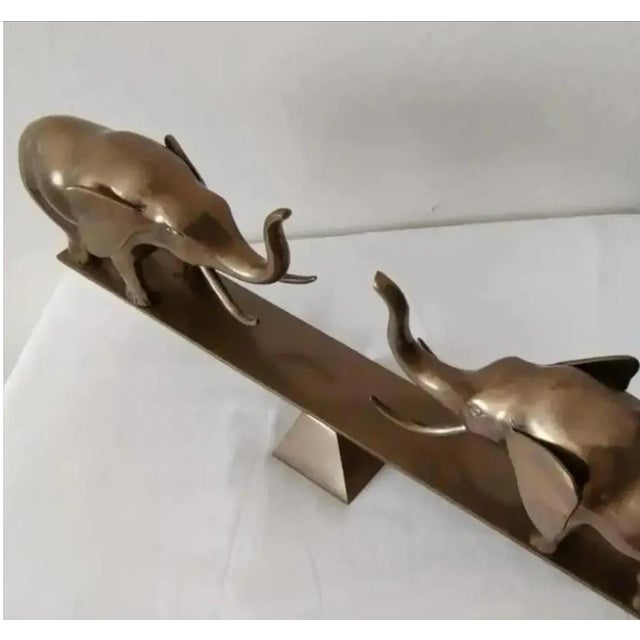 For Your Consideration. . . An extremely rare vintage DOLBI CASHIER brass sculpture of two elephants. This fabulous...