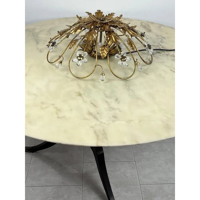 Banci ceiling light in gilded iron and crystal flowers, Italy, 1980s Purchased in Florence, produced by the Banci company,...