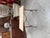 This antique bistro table has been fully restored. It features a raw wood (poplar) top and a cast iron base that retains...