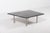 Beautiful Italian design architectural coffee table with irregular shape black marble top on a stainless steel base....
