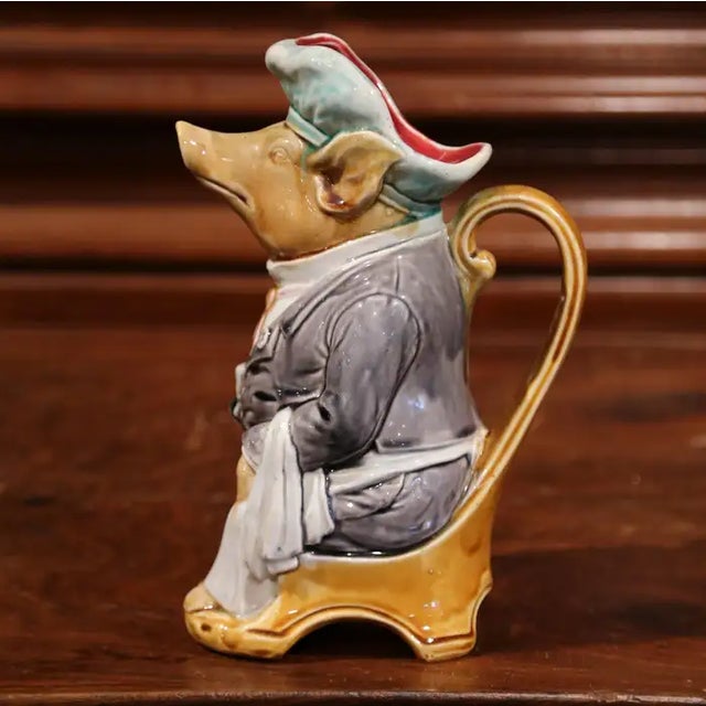 Colorful antique water pitcher from Northern France, crafted, circa 1880, the pitcher, called "Maitre d'Hotel" (or...