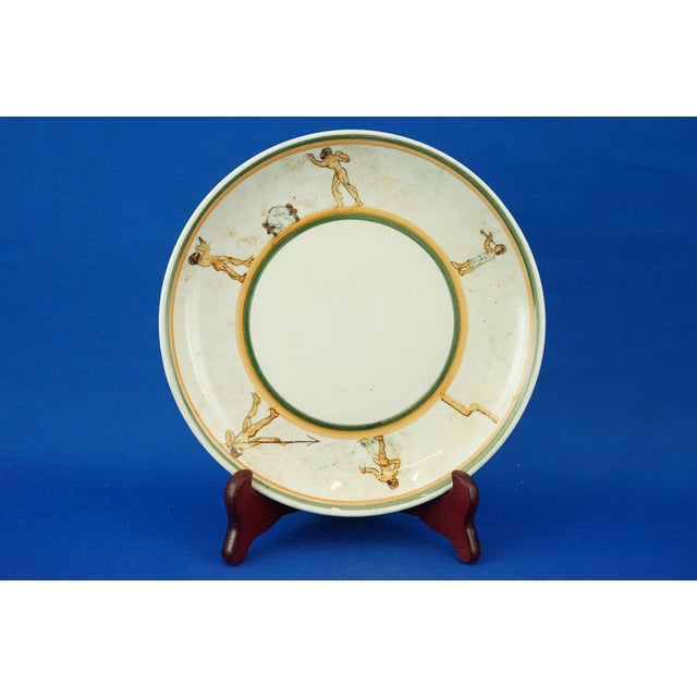 Medium-sized plate made of vitrified enameled ceramic, hand-shaped on a wheel and entirely hand-decorated. The rim...