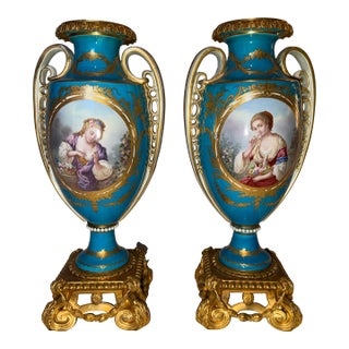 Pair of Antique French Sevres Porcelain Vases With Hand-Painted Portrait Panels and Gilt Bronze Bases, Circa 1900 For Sale