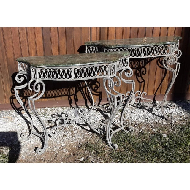 Pair of French 1940's Art Deco consoles in forged iron. René Drouet (Designer), Height: 30 in. (76.2 cm) Width: 39 in....