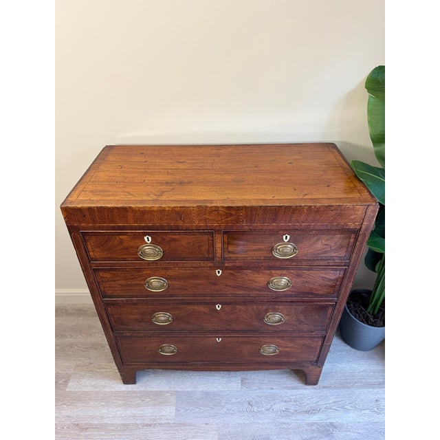 Solid wood antique chest of drawers (late Georgian/early Victorian). This is beautifully made with antique mahogany,...