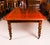 This is a beautiful antique William IV flame mahogany and decoratively crossbanded extending dining table, dating from...