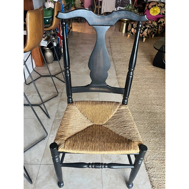 Pair of American Fiddleback or Queen Anne style side chairs with a black painted maple frame and a woven rush seat. It...
