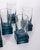 Set of 11 glasses with a square base in blue crystal and a transparent goblet, Italian design, 1970s.