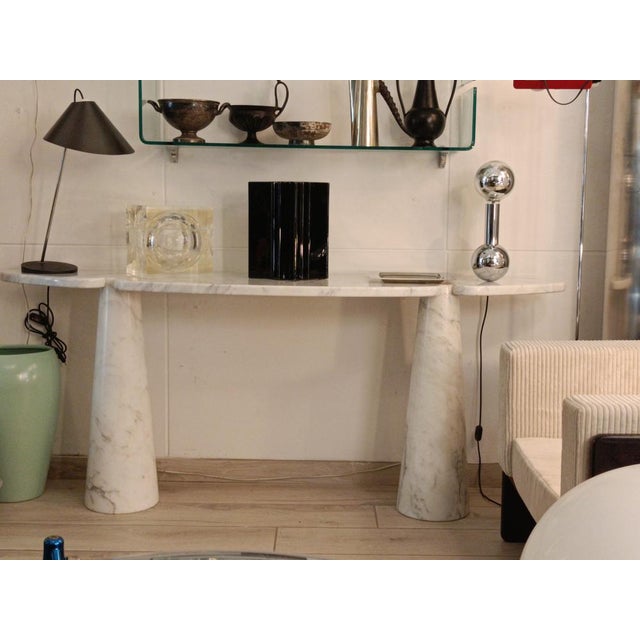 A stunning white Carrara marble console table from the Eros series designed by Angelo Mangiarotti, featuring a large...