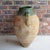 This antique Turkish olive jar is a stunning piece of Mediterranean pottery that will add a touch of rustic European charm...