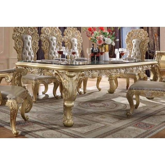 The Casa Milano Bellagio Collection brings grand European luxury into the formal dining room. This 12-piece gold dining...