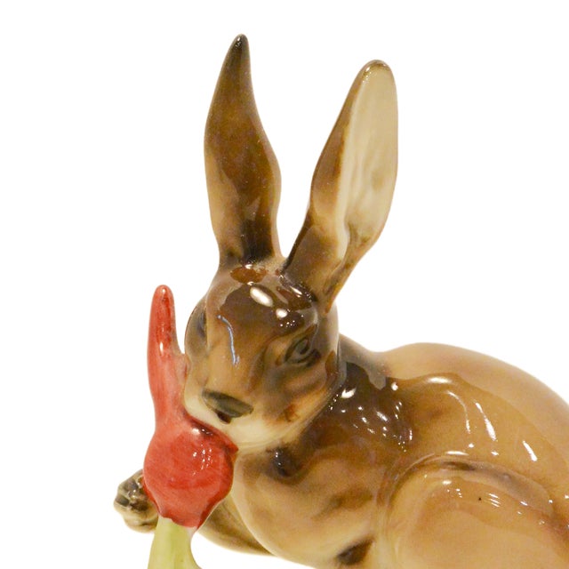 Presenting an exquisite example of Mid-Century German porcelain artistry: the "Bunny with Carrot" figurine, designed by...