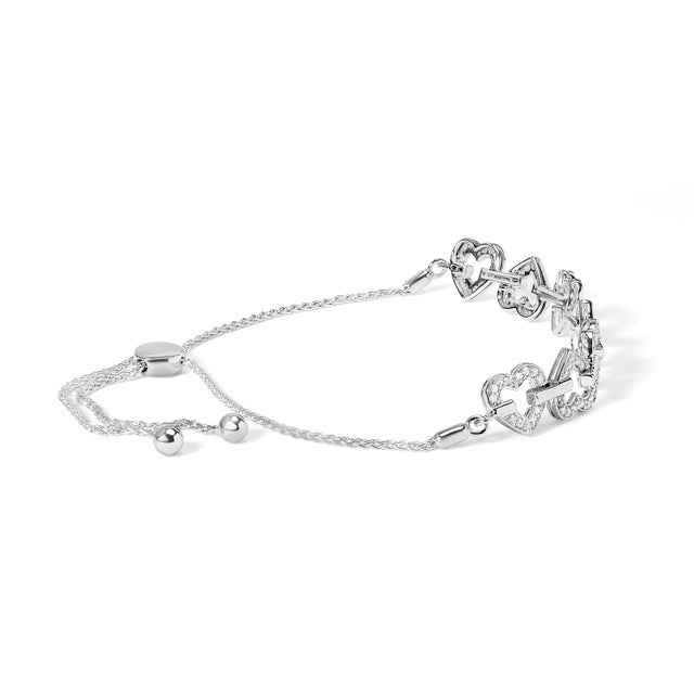Indulge in the luxurious romance of the .925 Sterling Silver Bolo Bracelet, a masterpiece designed to capture hearts with...